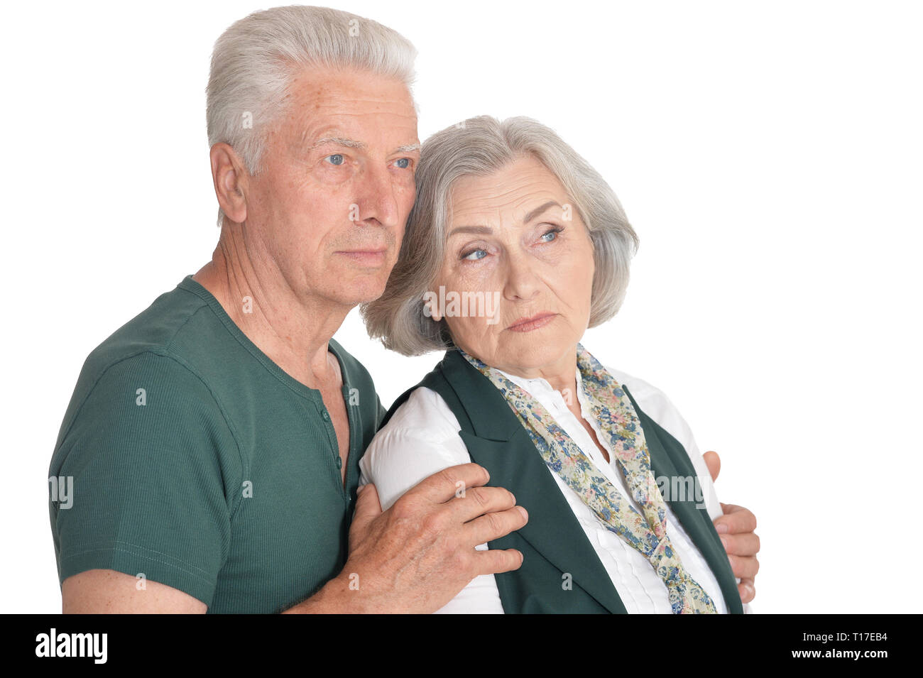 Portrait of thinking senior couple on white background Stock Photo
