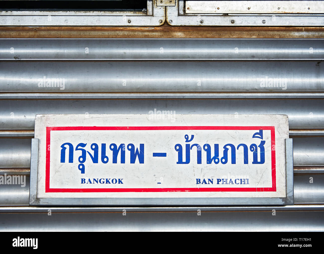 Bangkok, Thailand: Signage on a silver colored coach inside Hua Lamphong Train Station informing about the route of the train Stock Photo