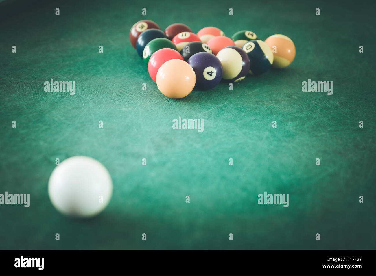Billard balls and table in a bar Stock Photo - Alamy