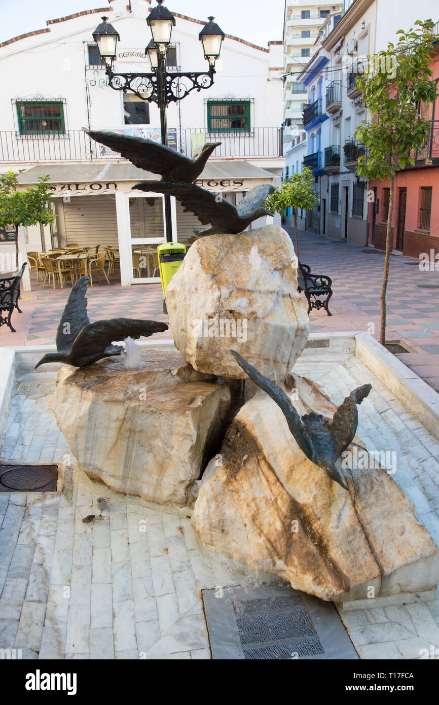 Small rock and Seagull fountain in the Plaza braille, Fuengirola, Costa del Sol, Spain. Stock Photo