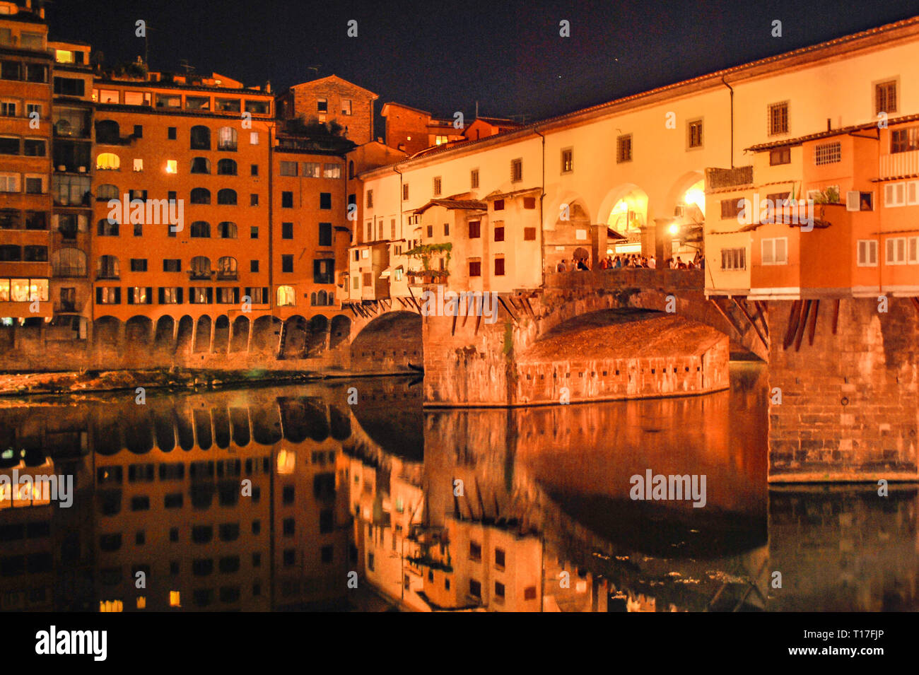River Arno and famous bridge Ponte Vecchio at sunset from Ponte alle Grazie in Florence, Tuscany, Italy Stock Photo