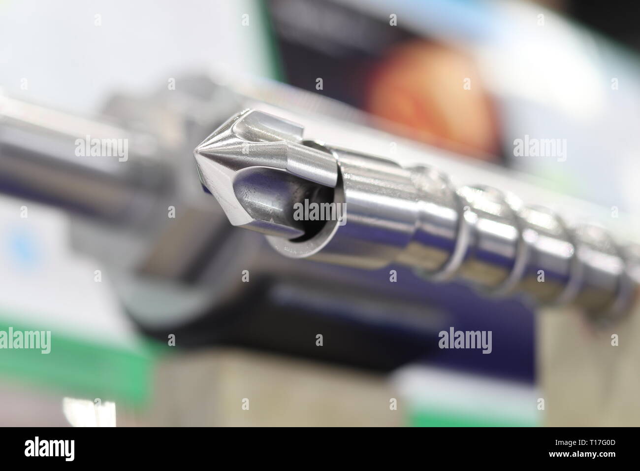 Screw press parts for plastic injection machine ; selective focus Stock Photo
