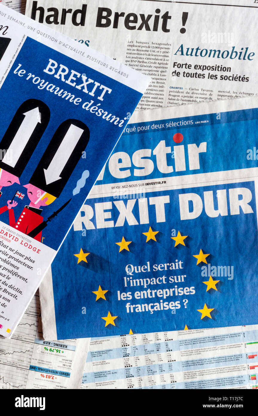 French newspaper articles about the UK leaving the EU and the dangers of hard Brexit. Stock Photo