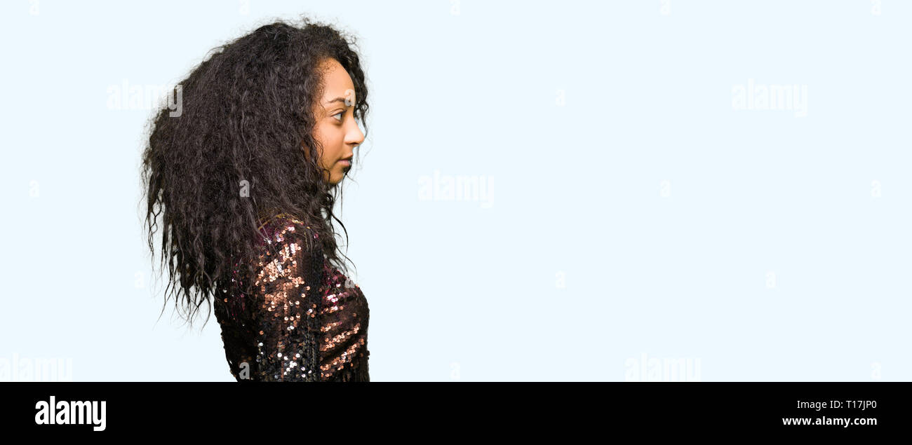 Young Beautiful Girl With Curly Hair Wearing Night Party Dress