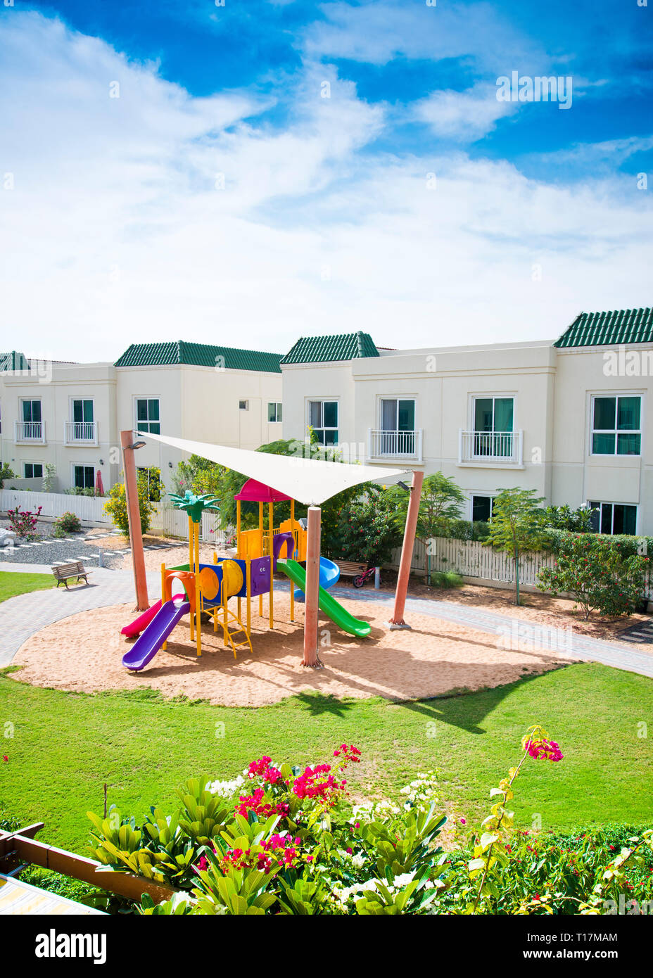 small playground in gated community empty of children and adults due to