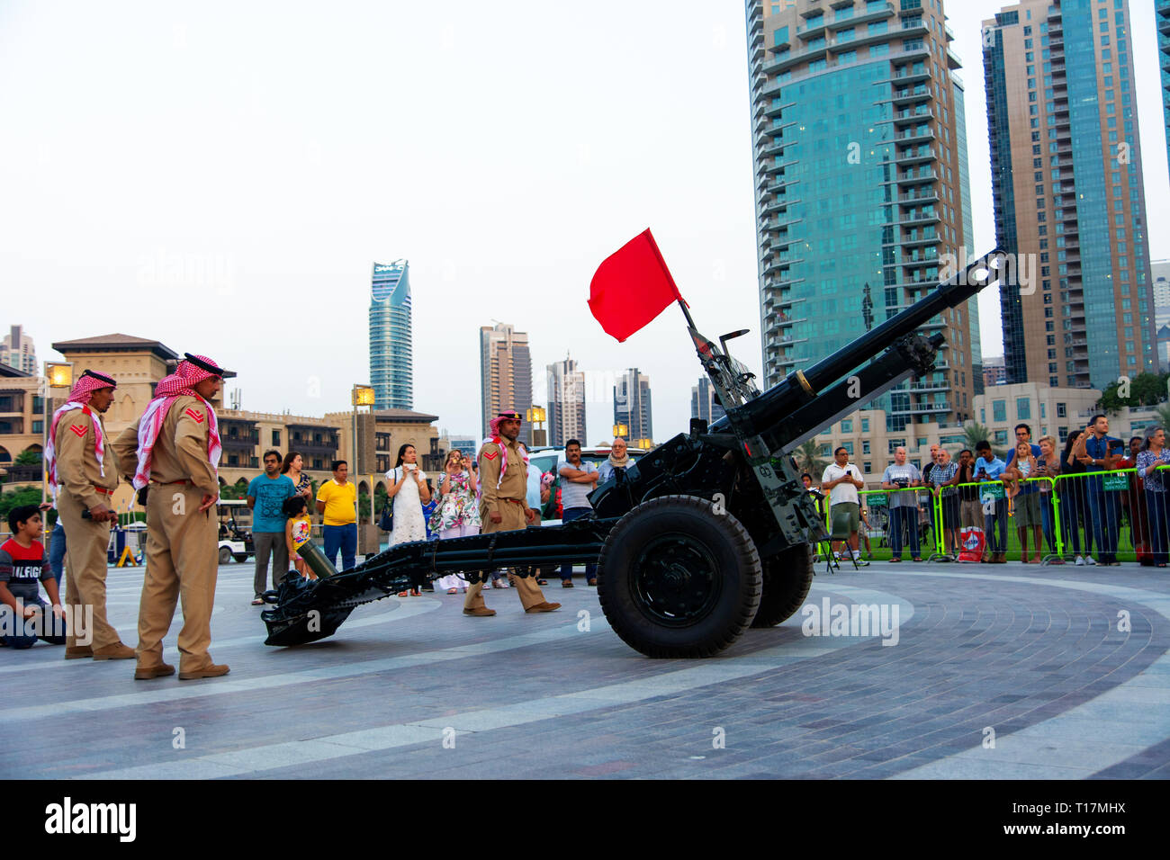Dubai, United Arab Emirates - May 18, 2018: Ramadan Canon and soldiers in front of Burj Khalifa and the Dubai mall fountain to signal the end of the d Stock Photo