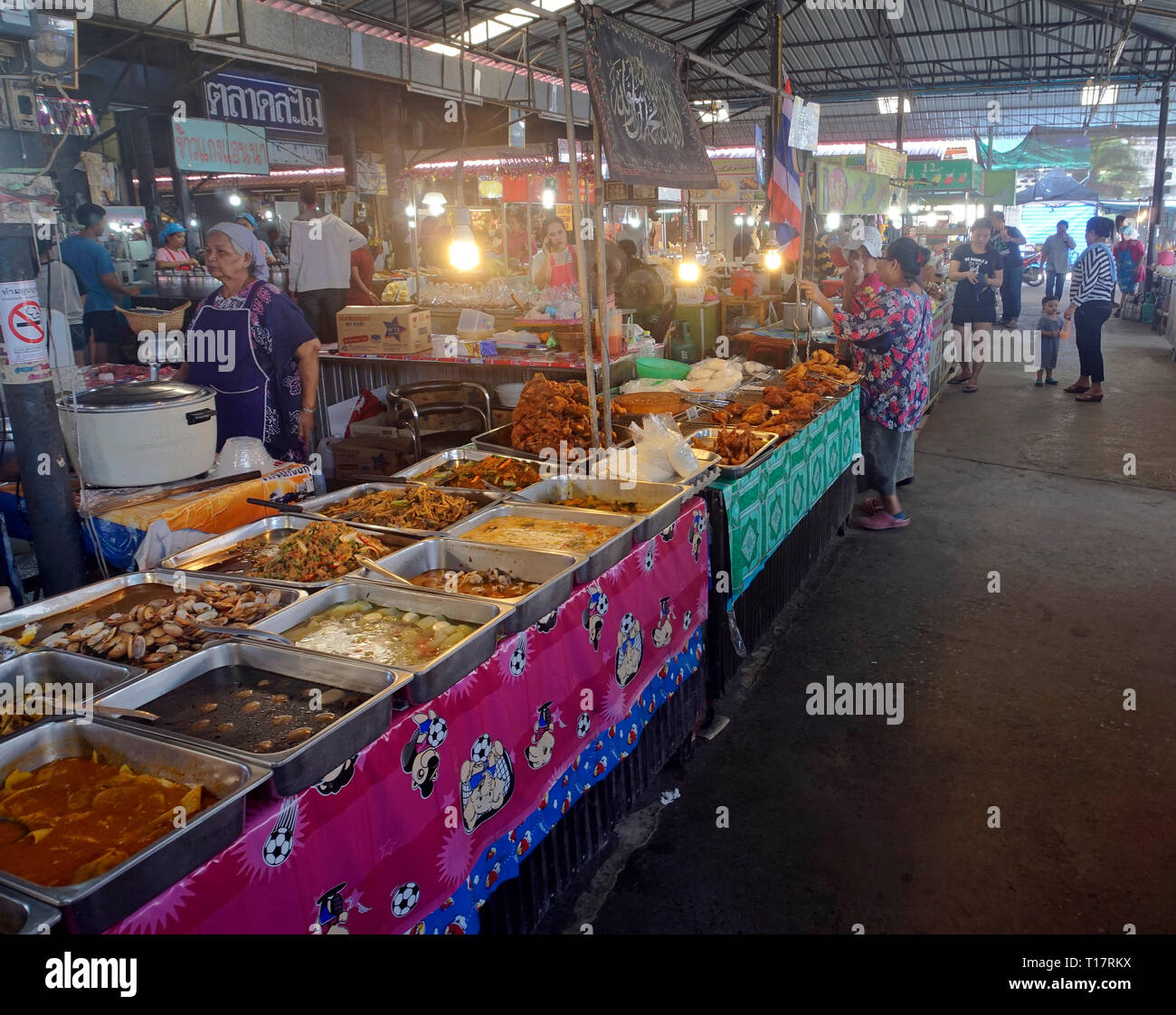 Thai women sells fresh cooked food at Lamai market, Lamai center, Koh Samui, Surat Thani, Gulf of Thailand, Thailand Stock Photo