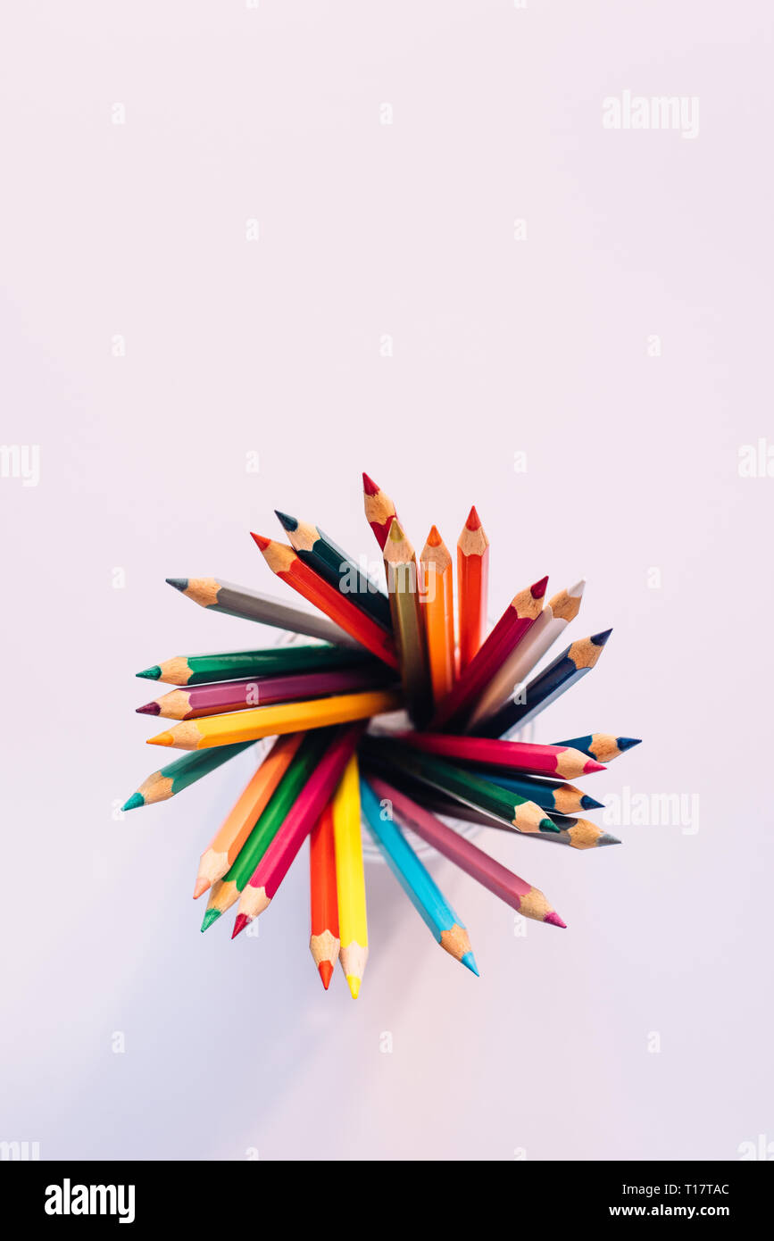 Colored pencils in a glass Stock Photo