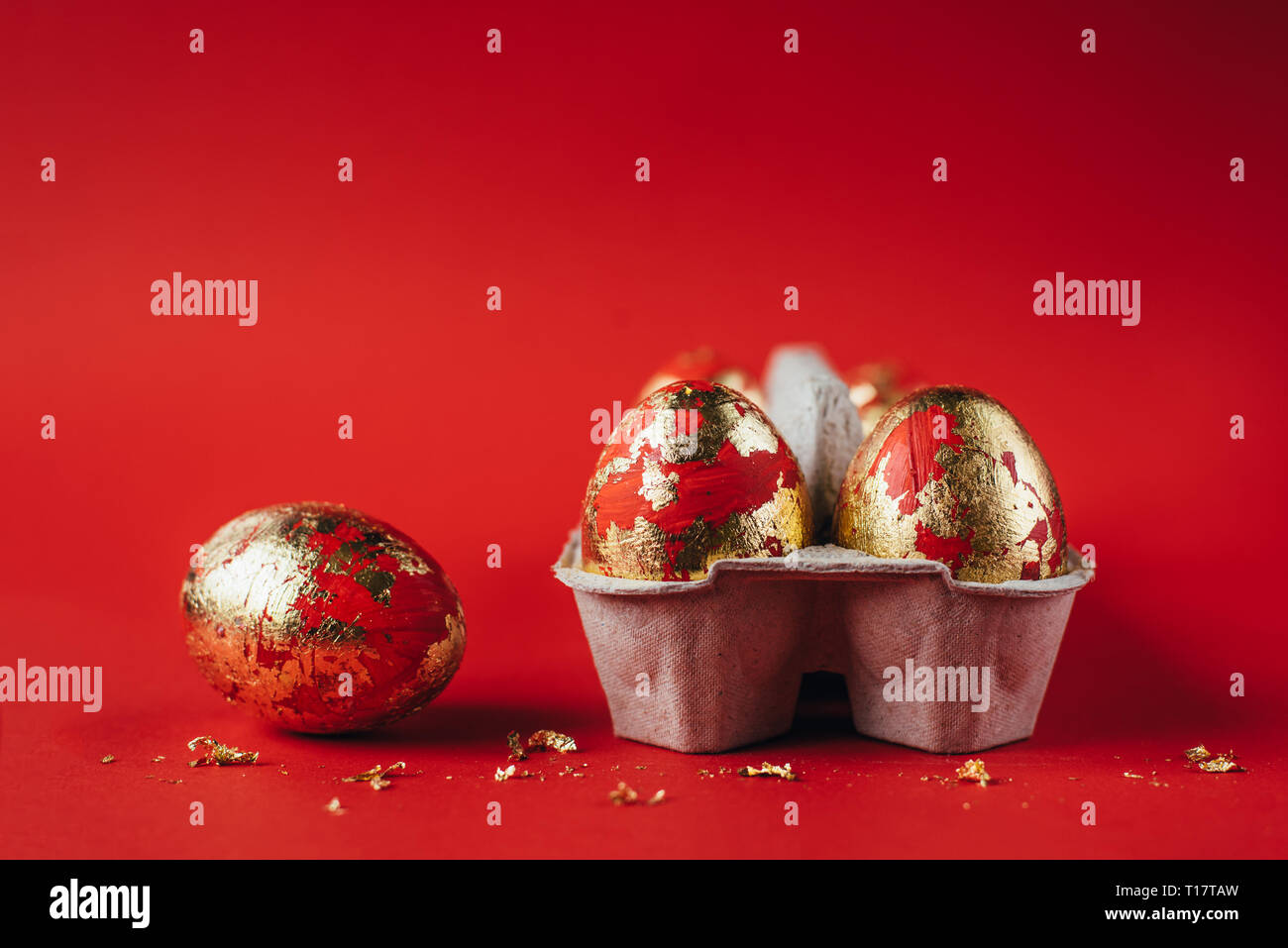 Red painted Easter eggs on red background Stock Photo