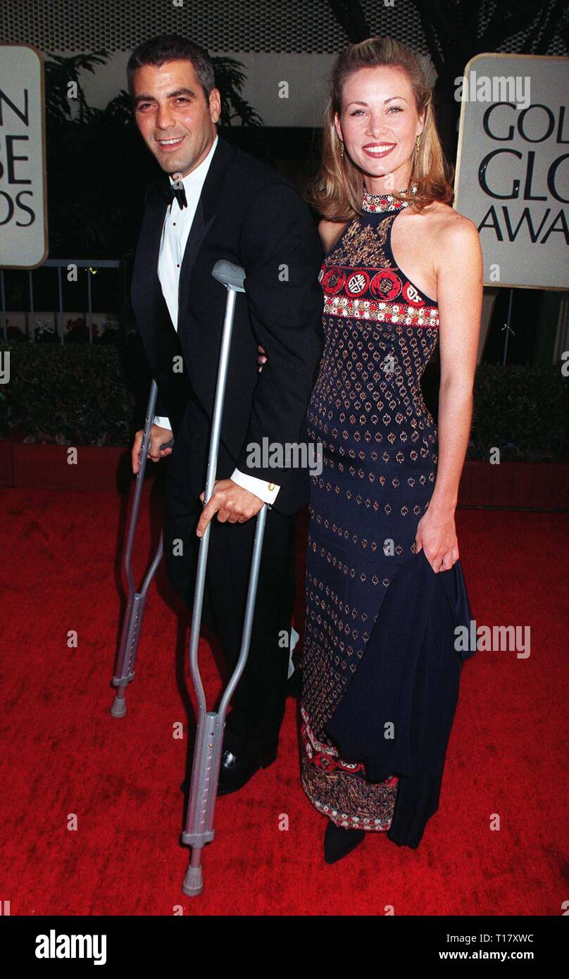 LOS ANGELES, CA. January 20, 1997: Actor George Clooney & girlfriend Celine Balitran at the Golden Globe Awards. Stock Photo