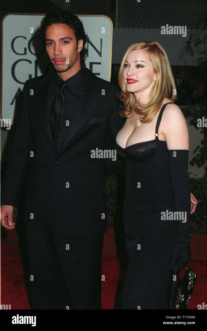 LOS ANGELES, CA. January 19, 1997: Actress/singer Madonna with boyfriend Carlos Leon at the Golden Globe Awards where she won Best Actress in a Musical or Comedy for 'Evita.' Stock Photo