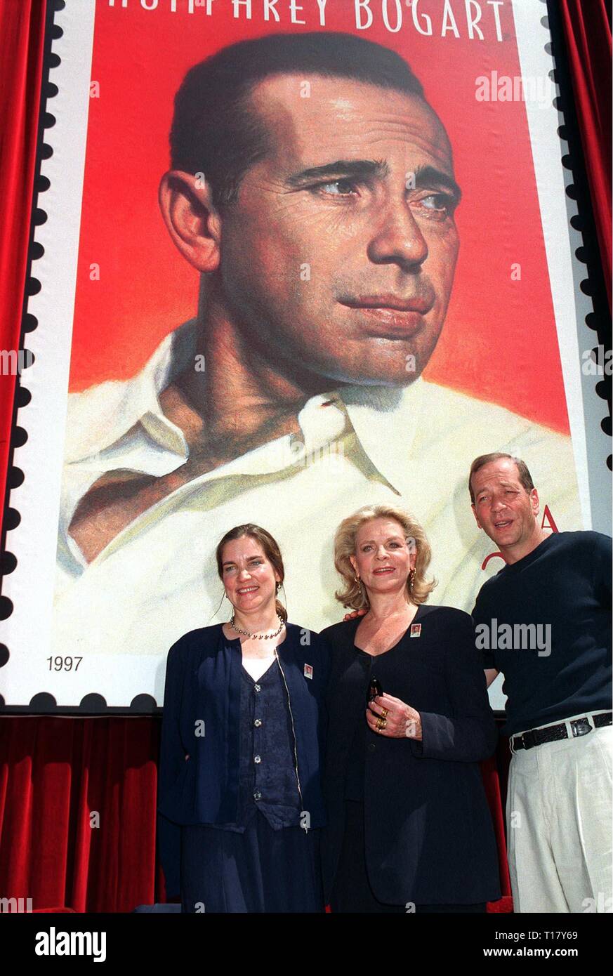 LOS ANGELES, CA. July 31, 1997:   Actress Lauren Bacall (centre) with children Stephen & Leslie Bogart at unveilling ceremony in Hollywood for new US postage stamp honoring actor Humphrey Bogart. Stock Photo