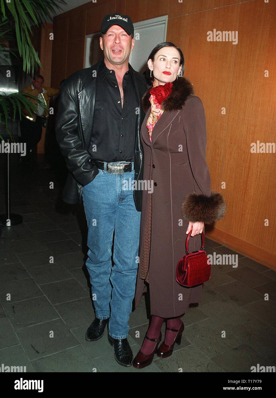 LOS ANGELES, CA. November 10, 1997:   Actor Bruce Willis & actress wife Demi Moore at the world premiere, in Beverly Hills, of his new movie 'The Jackal.' Willis stars in the movie with Richard Gere. Stock Photo