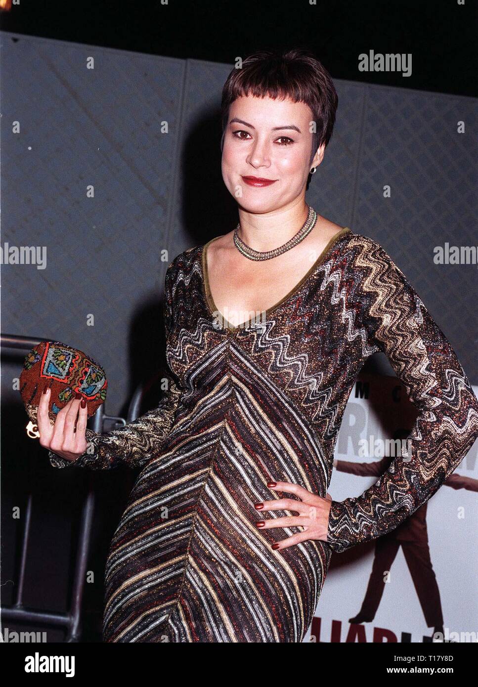 LOS ANGELES, CA. March 19, 1997:    Actress Jennifer Tilly at the premiere of her new movie, 'Liar Liar' in which she stars with Jim Carrey. Pix: PAUL SMITH Stock Photo