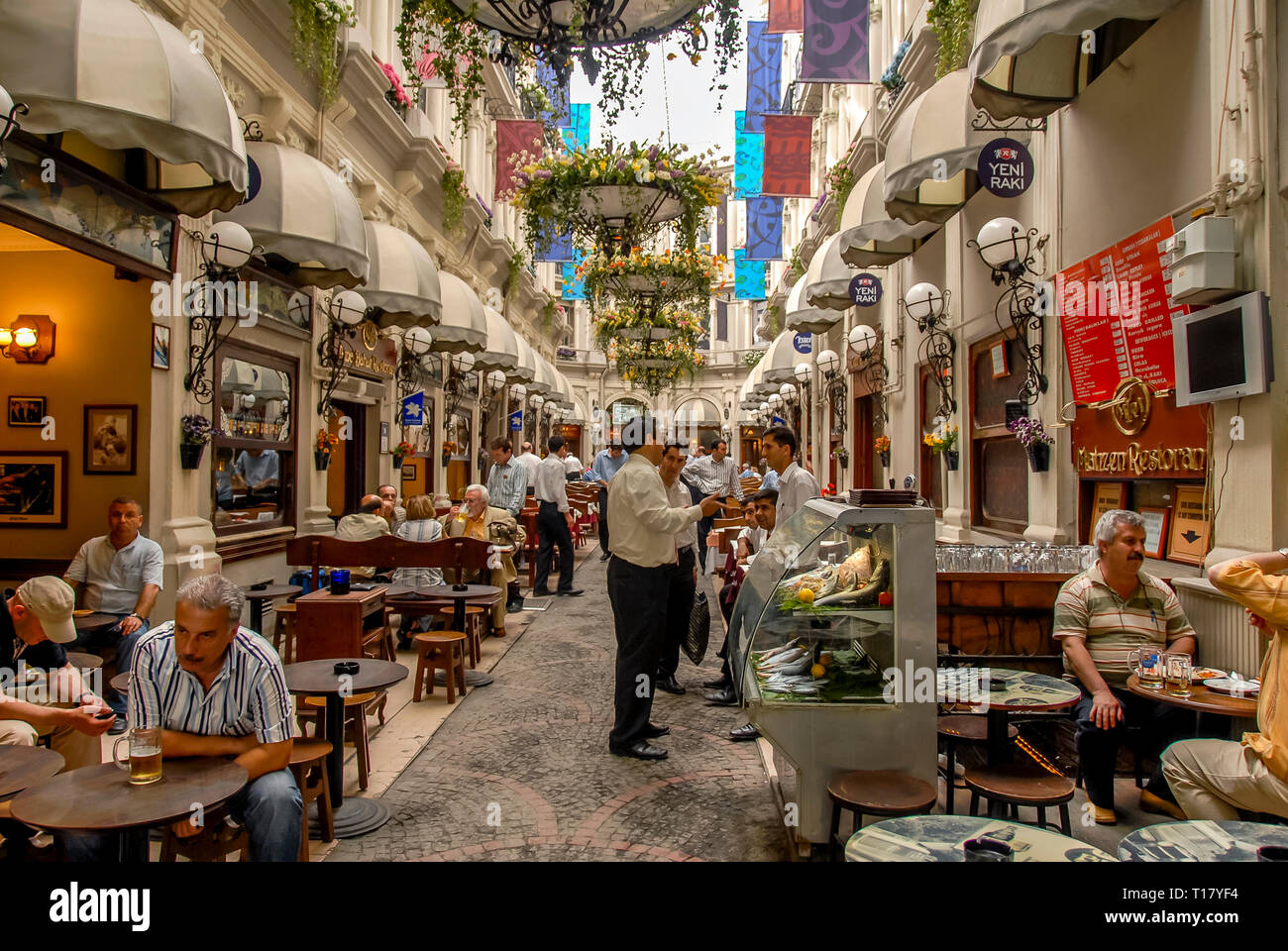 Istanbul, Turkey, 24 May 2006: Cicek Pasaji (literally Flower Passage in Turkish), originally called the Cite de Pera, is a famous historic passage (g Stock Photo