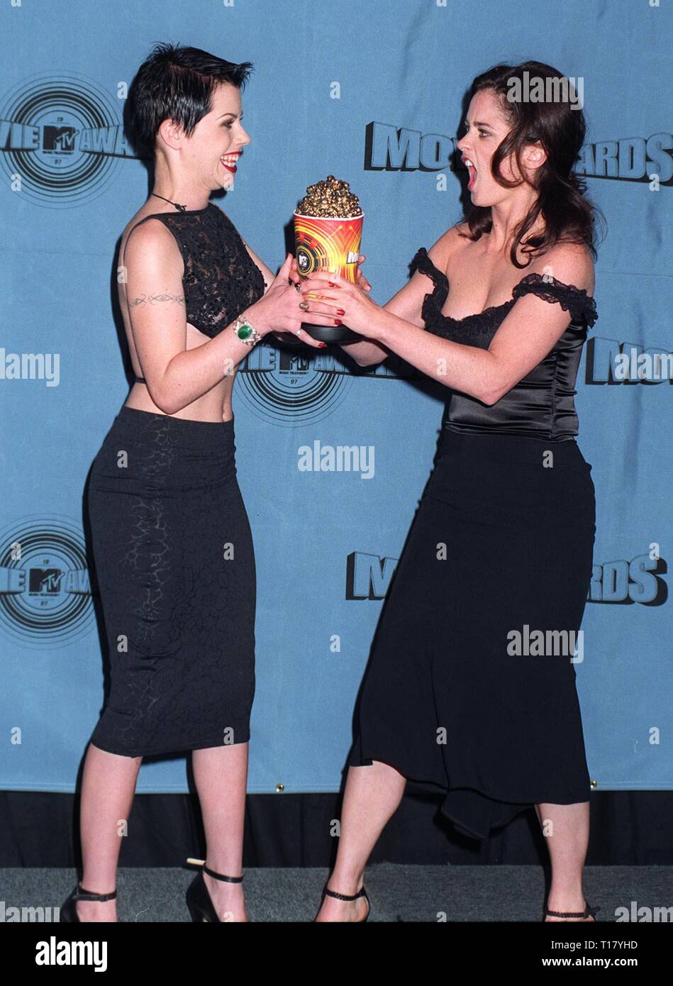 LOS ANGELES, CA. June 08, 1997:   Fairuza Balk (left) & Robin Tunney at the MTV Movie Awards in Los Angeles. Stock Photo