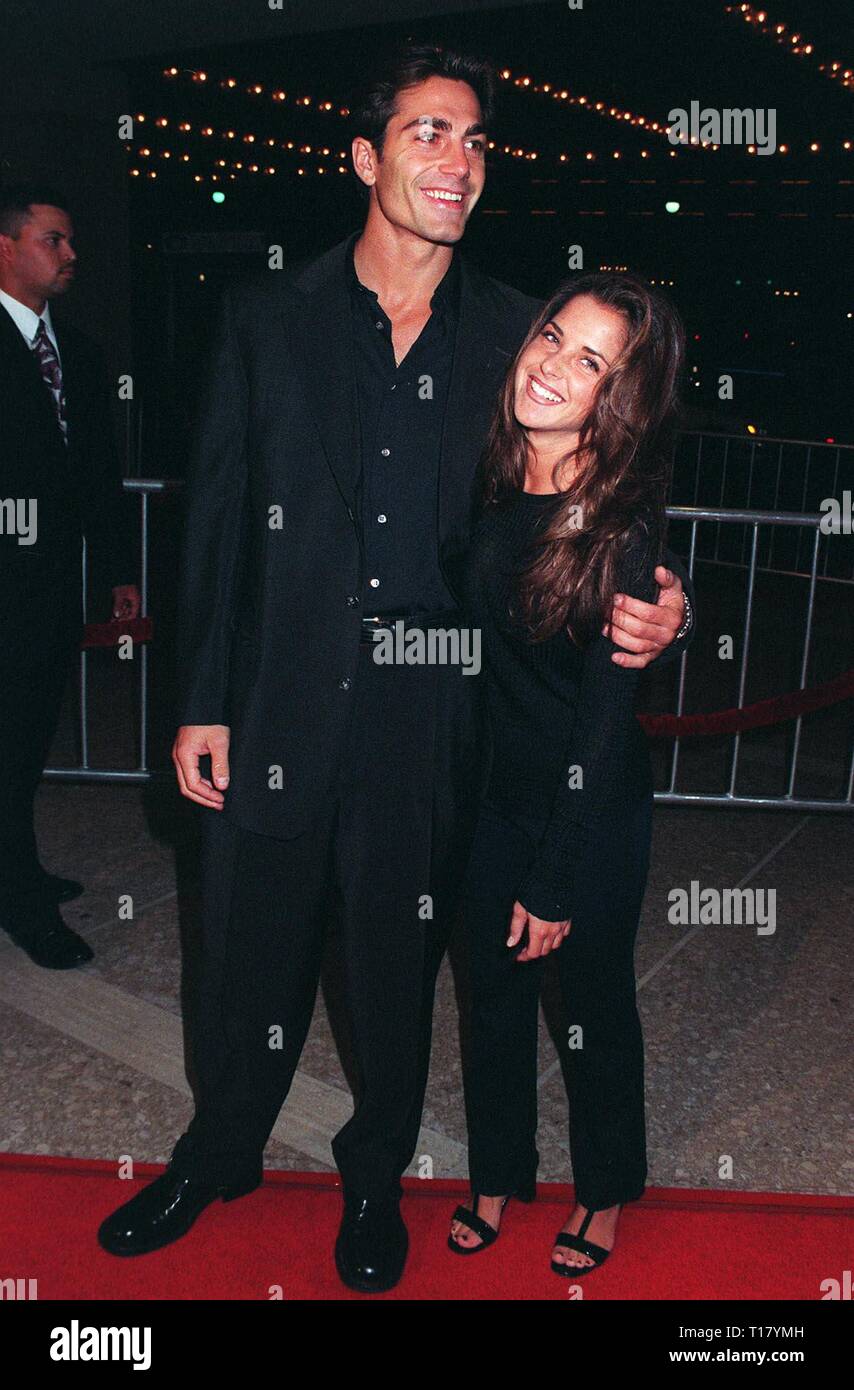 LOS ANGELES, CA. November 13, 1997:   Actor Michael Bergin & girlfriend at premiere of 'One Night Stand,' which stars Nastassja Kinski & Wesley Snipes. Stock Photo