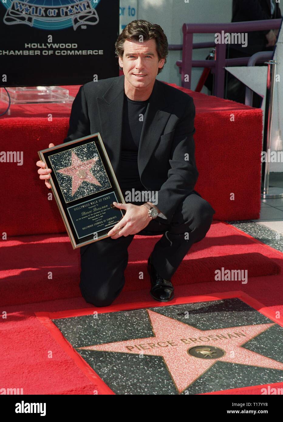 LOS ANGELES, CA. December 03, 1997: Actor Pierce Brosnan receives his star  on the Hollywood Walk of Fame Stock Photo - Alamy