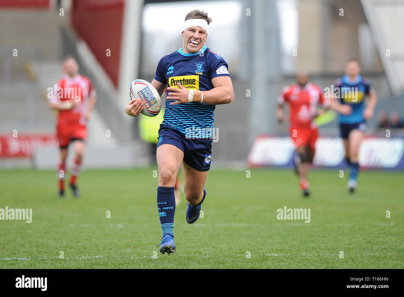 Salford, UK. 24th March 2019.  AJ Bell Stadium, Salford, England; Rugby League Betfred Super League, Salford Red Devils vs Wigan Warriors;Wigan Warriors George Williams runs clear to complete a hat-trick. Credit: Dean Williams/Alamy Live News Stock Photo