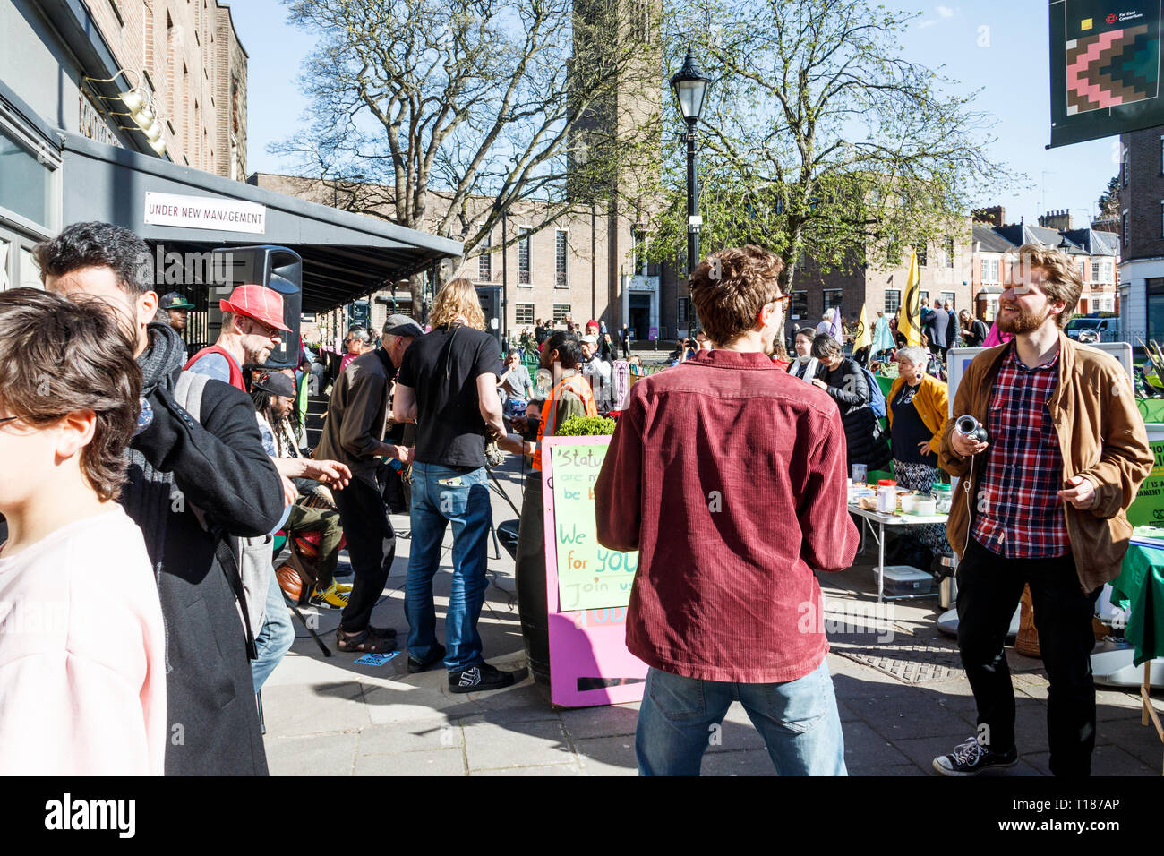 Crouch End, London, UK. 24th March 2019. “Rebel For Life”: the Campaign group Extinction Rebellion stop traffic in a peaceful demonstration on climate change. Traffic was stopped for just four minutes at a time. Credit: Michael Heath/Alamy Live News Stock Photo