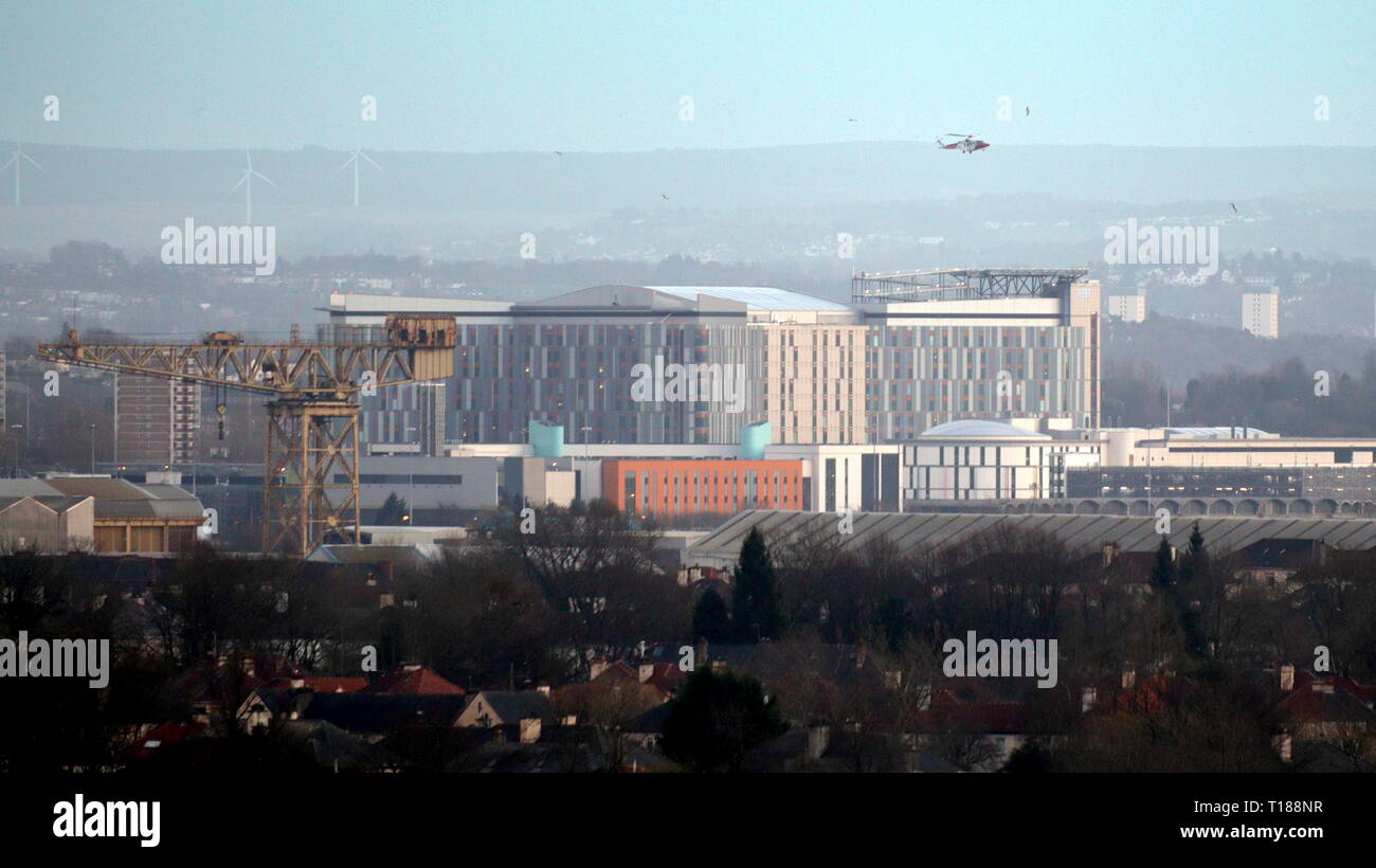 Glasgow, Scotland, UK. 24th March, 2019. Emergency Helicopter lands at 6.30pm at the Queen Elizabeth Hospital helipad. the suspected cause of all the pigeon fungal deaths at the building Credit: Gerard Ferry/Alamy Live News Stock Photo