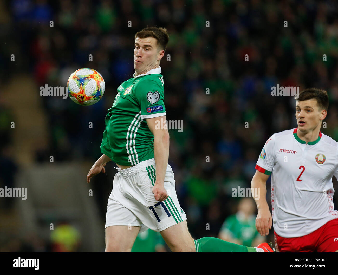 Windsor Park, Belfast, Northern Ireland. 24th Mar, 2019. UEFA European Championships Qualification football, Northern Ireland versus Belarus; Paddy McNair of Northern Ireland chests the ball Credit: Action Plus Sports/Alamy Live News Stock Photo