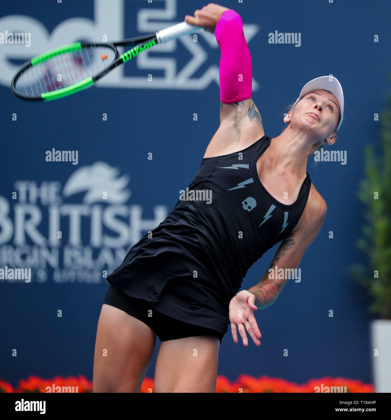 Miami Gardens, Florida, USA. 24th Mar, 2019. Polona Hercog, of Slovenia,  serves against Simona Halep, of Romania, during a third round match at the  2019 Miami Open Presented by Itau professional tennis