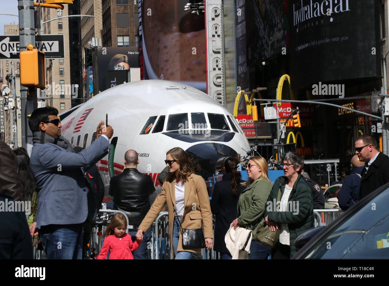 New York, USA. 24th March, 2019. A Lockheed Constellation plane know as 'Connie' has rolled  into Times Square, New York. The plane was built for Trans World Airlines, commissioned by the late recluse billionaire Howard Hughes in 1939. Hughes broke the trans -continental flight record, from Burbank, California to New York in 1946 piloting the plane which was delivered to TWA in 1958. After a checked past the aircraft final destination is JFK Airport and is to be transformed into a cocktail lounge at the newly refurnished TWA Flight Center hotel. © 2019 Credit: G. Ronald Lopez/Alamy Live News Stock Photo