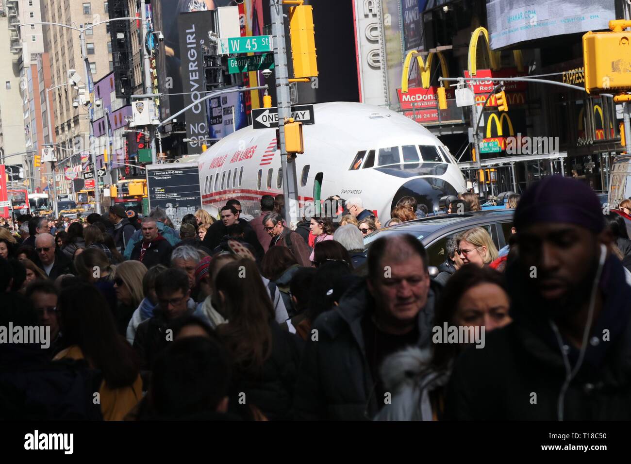 New York, USA. 24th March, 2019. A Lockheed Constellation plane know as 'Connie' has rolled  into Times Square, New York. The plane was built for Trans World Airlines, commissioned by the late recluse billionaire Howard Hughes in 1939. Hughes broke the trans -continental flight record from Burbank, California to New York in 1946 piloting the plane which was delivered to TWA in 1958. After a checked past the aircraft final destination is JFK Airport and is to be transformed into a cocktail lounge at the newly refurnished TWA Flight Center hotel. © 2019 Credit: G. Ronald Lopez/Alamy Live News Stock Photo