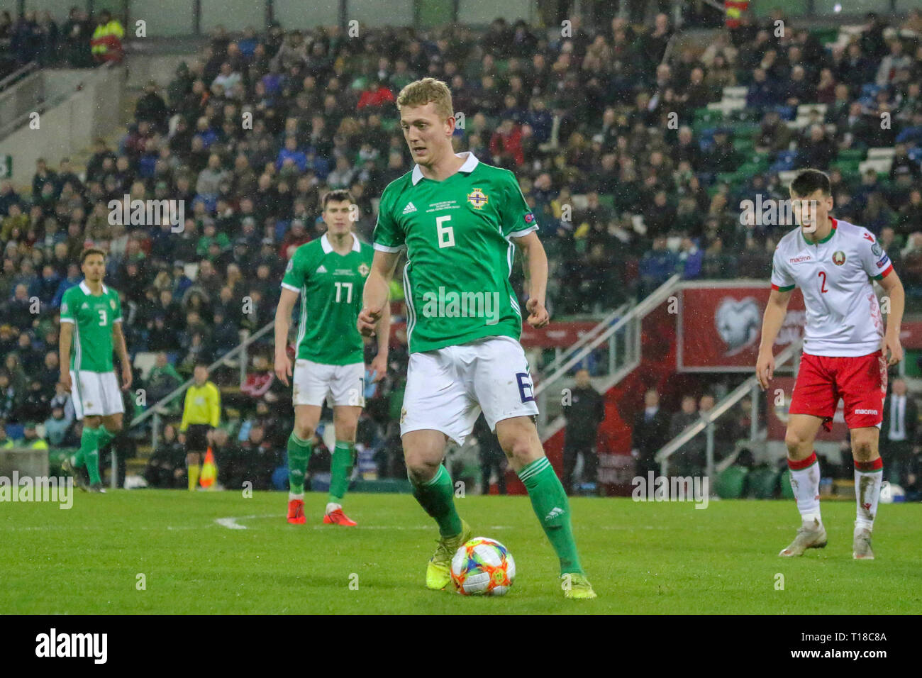 National Football Stadium at Windsor Park, Belfast, Northern Ireland. 24  March 2019. UEFA EURO 2020 Qualifier- Northern Ireland v Belarus. Action from tonight's game. George Saville (6) in action for Northern Ireland.. Credit: David Hunter/Alamy Live News. Stock Photo