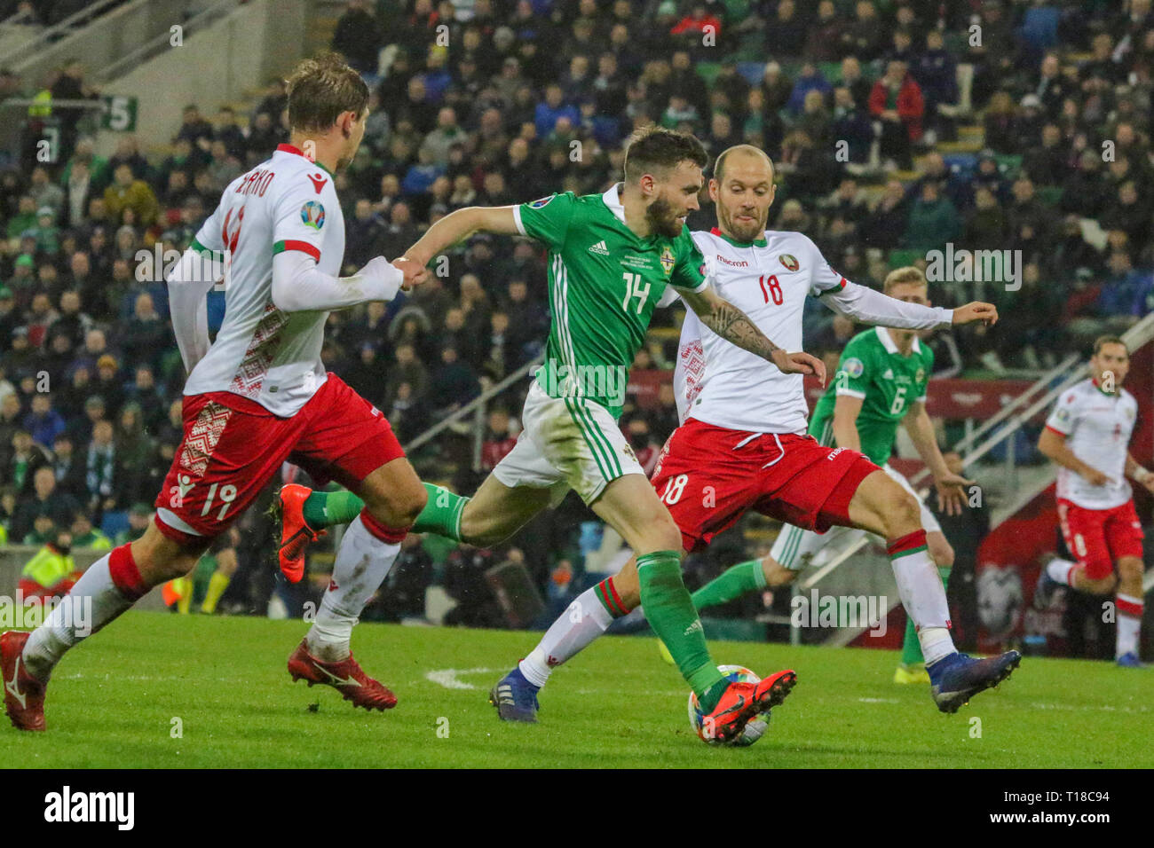 National Football Stadium at Windsor Park, Belfast, Northern Ireland. 24  March 2019. UEFA EURO 2020 Qualifier- Northern Ireland v Belarus. Action from tonight's game. Stuart Dallas (14) on the attack for Northern Ireland. Credit: David Hunter/Alamy Live News. Stock Photo