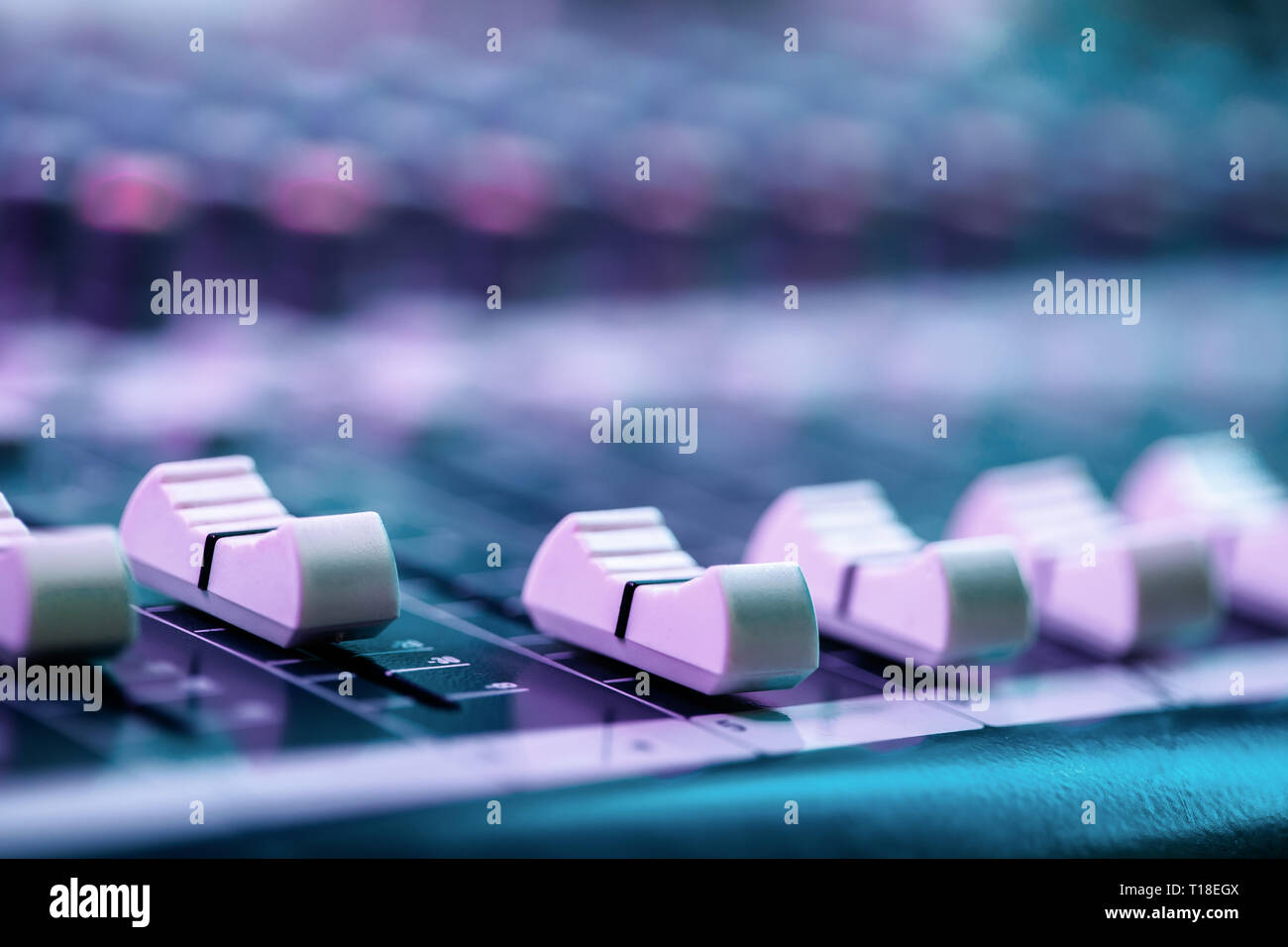 Close up of fader's on sound mixing console. Details of sound engineer room. Stock Photo