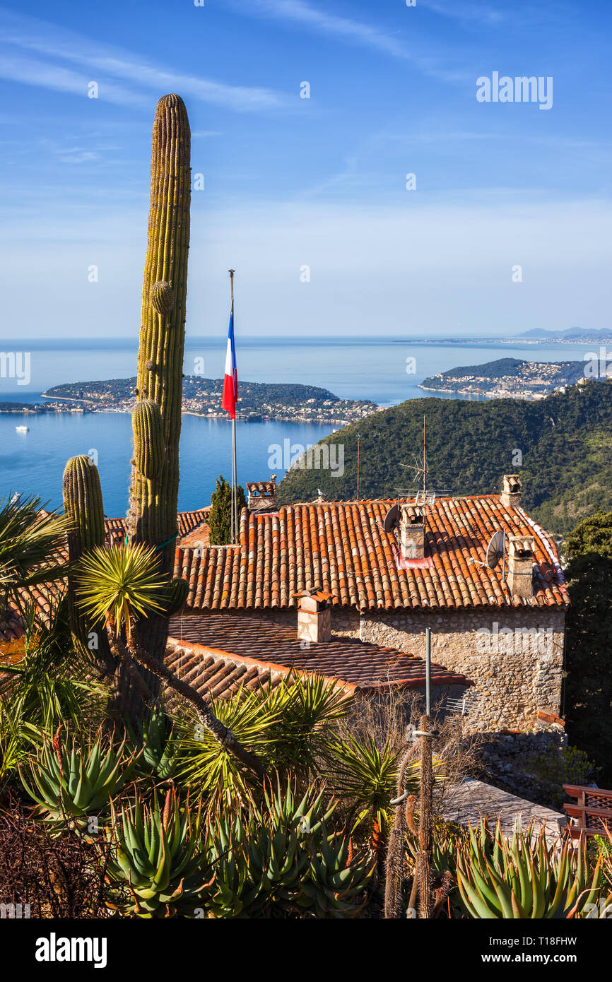 Eze village tiled houses on mountain top by the Mediterranean Sea in