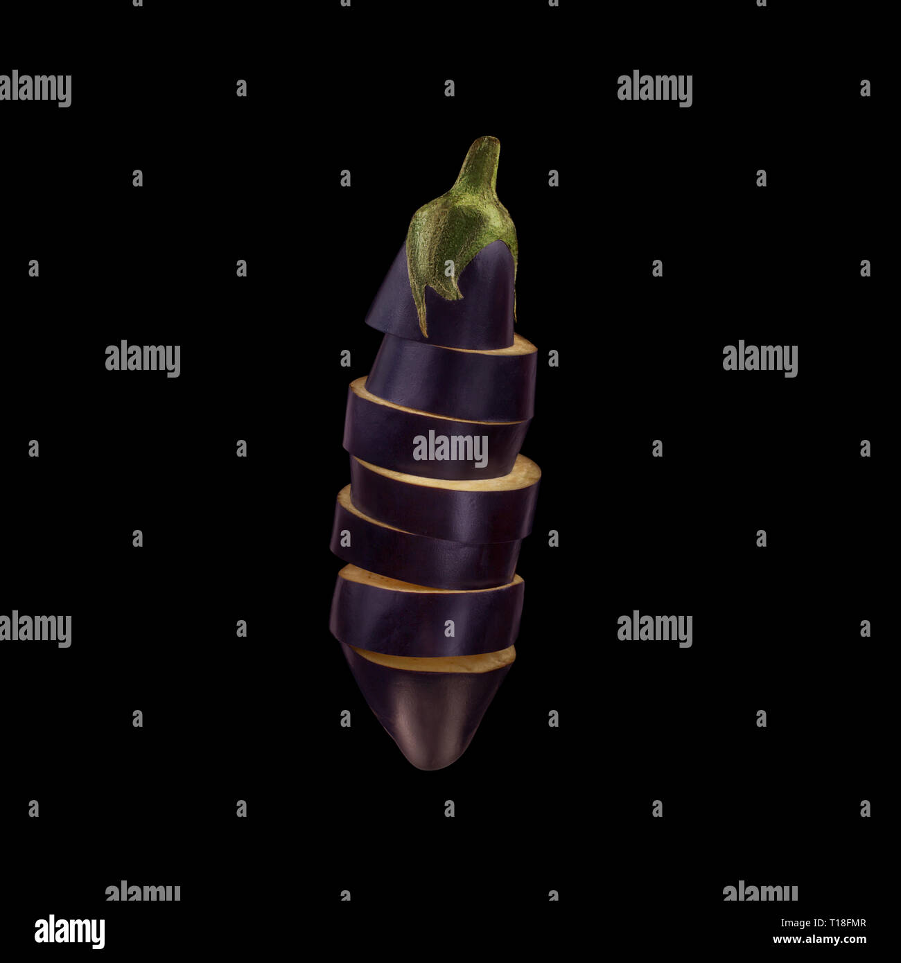 Eggplant sliced isolated on black background. Minimal concept. Stock Photo