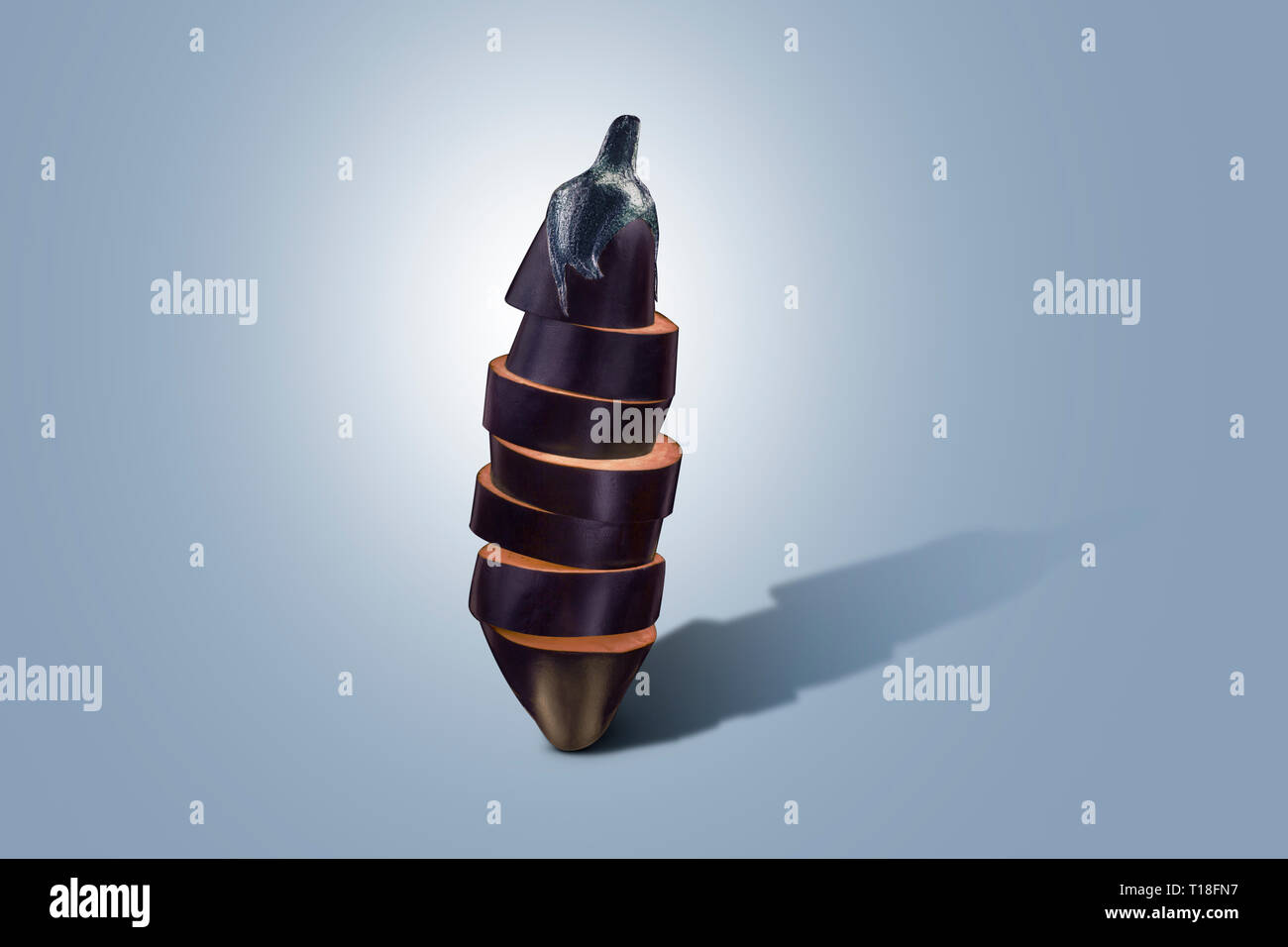 Eggplant sliced vertically on a blue background. Minimal vegetable
