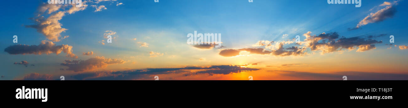 Summer sunset sky with clouds panorama background Stock Photo - Alamy