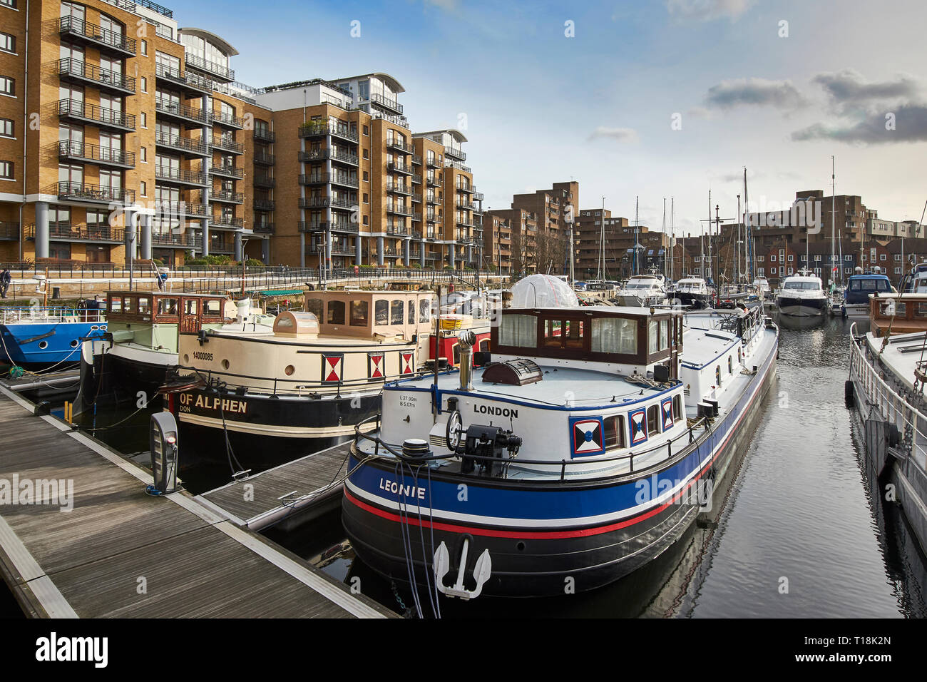 LONDON TOWER HAMLETS ST KATHARINE DOCKS MARINA WITH CANAL BOATS OR