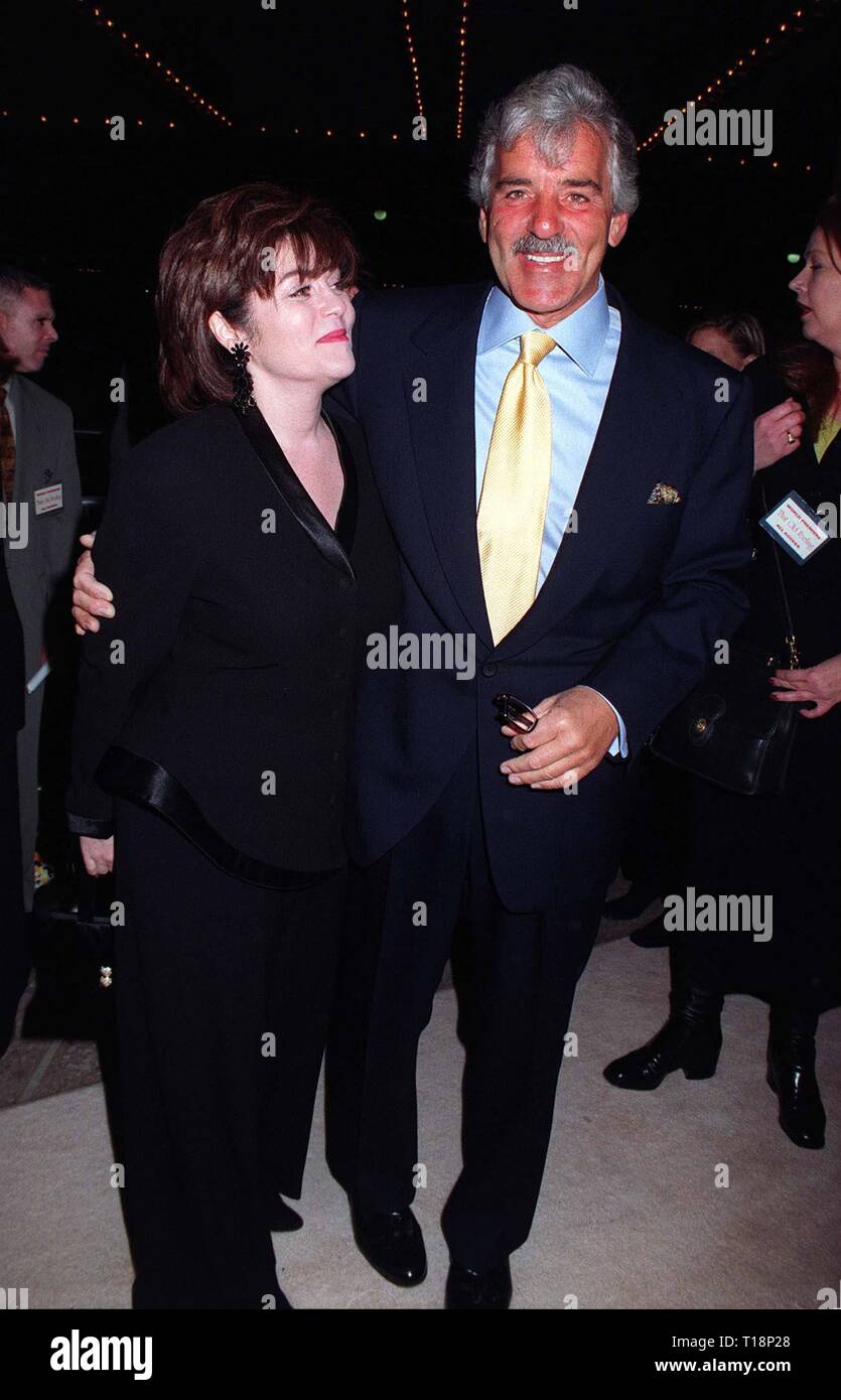 LOS ANGELES, CA. March 31, 1997: Actor DENNIS FARINA & wife at the premiere  of his