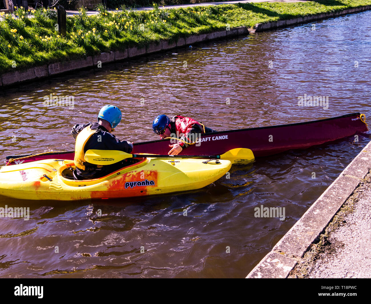 Canoe / Kayak training session teaching rescue in an open canoe, Llangollen canal, Froncysyllte, Wales Stock Photo