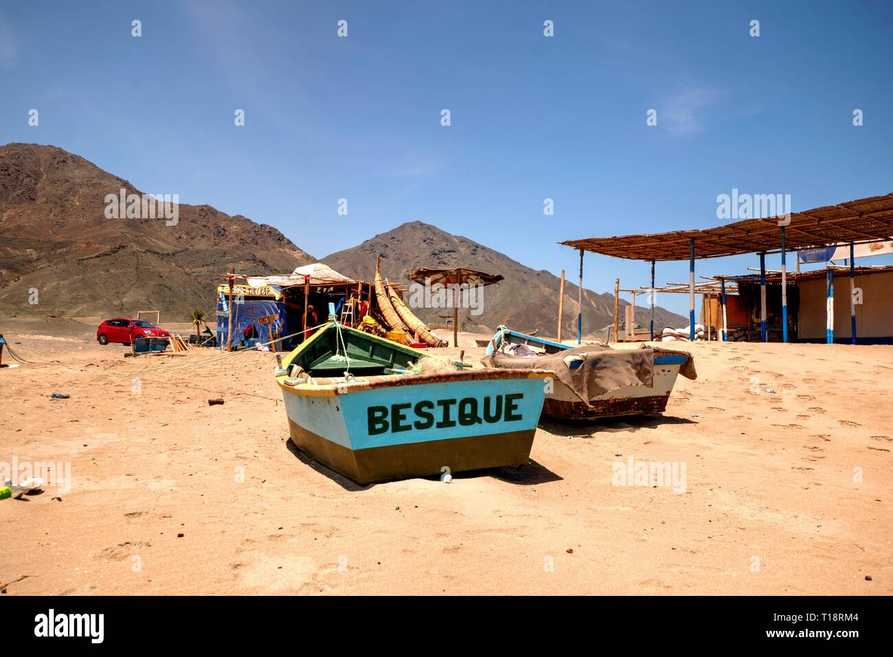 Chimbote, Peru - April 11, 2018: Beach at Vesique in north Peru with boats on beach Stock Photo