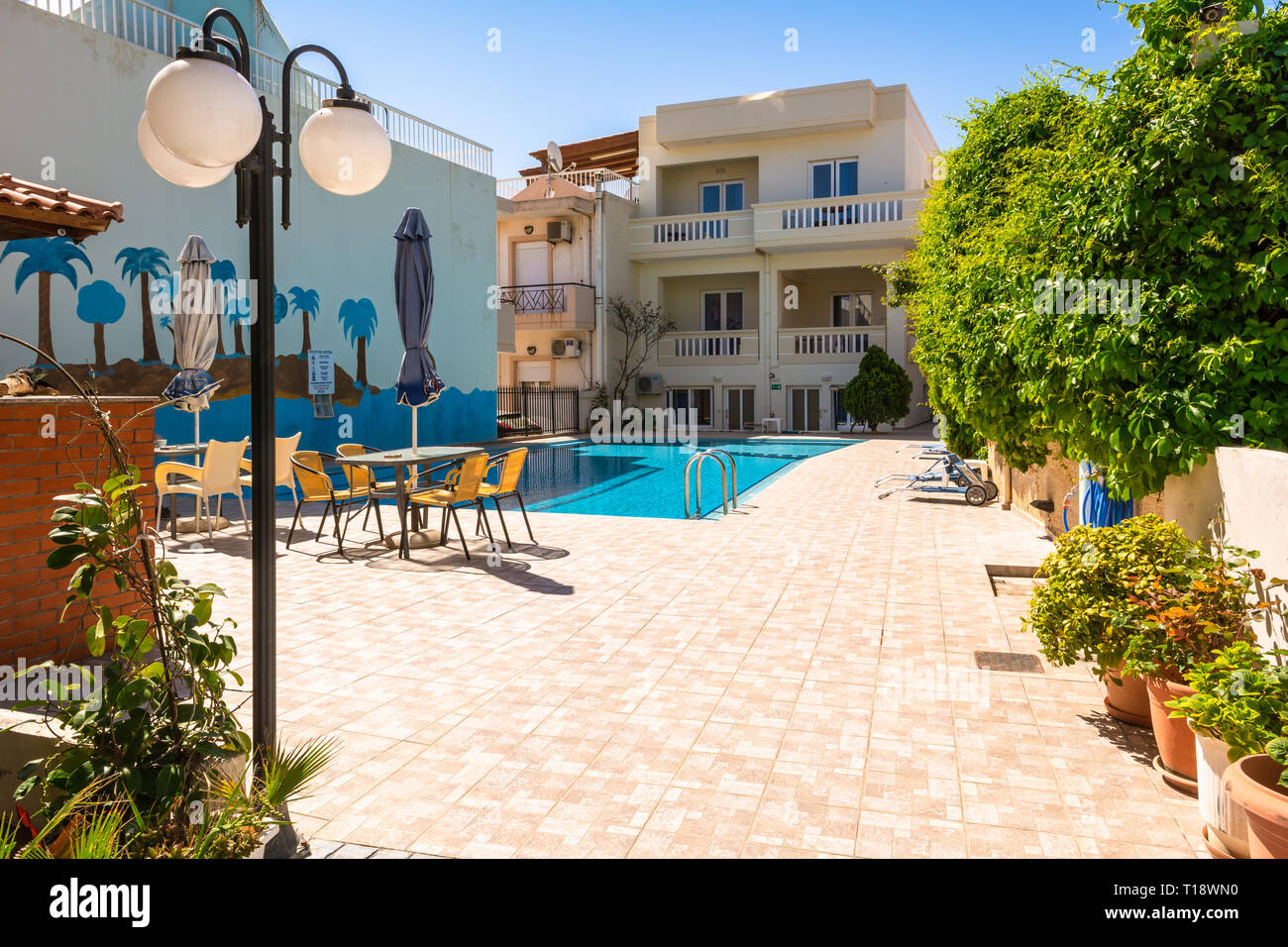CRETE, GREECE - May 2, 2015: A typical hotel with swimming pool in West  Crete Stock Photo - Alamy