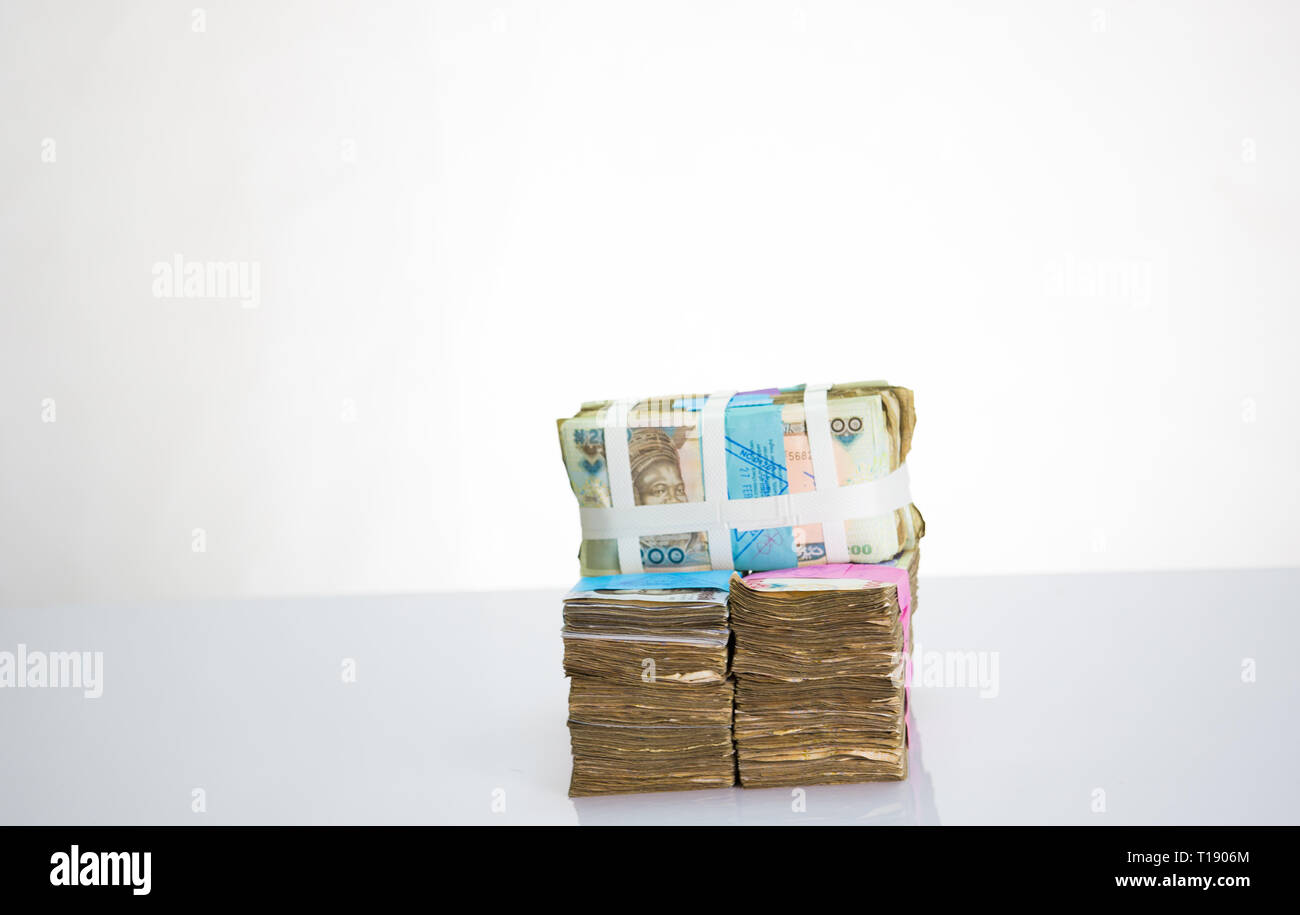 Stack of nigeria naira notes on white background Stock Photo
