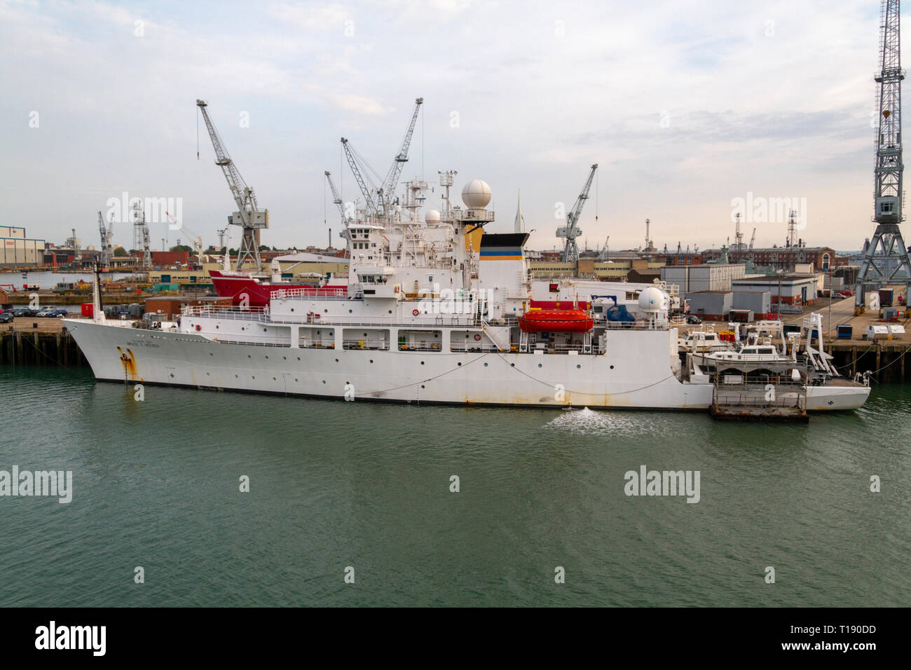 The USNS Bruce C. Heezen (T-AGS 64), a United States Navy Pathfinder class oceanographic survey ship in the Royal Navy Dockyard, Portsmouth, UK. Stock Photo