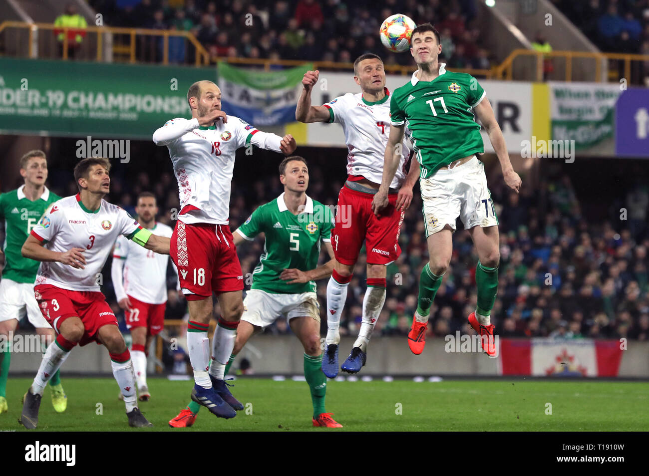 Northern Ireland's Paddy McNair (right) and Belarus' Igor Shitov battle for the ball during the UEFA Euro 2020 Qualifying, Group C match at Windsor Park, Belfast. Stock Photo