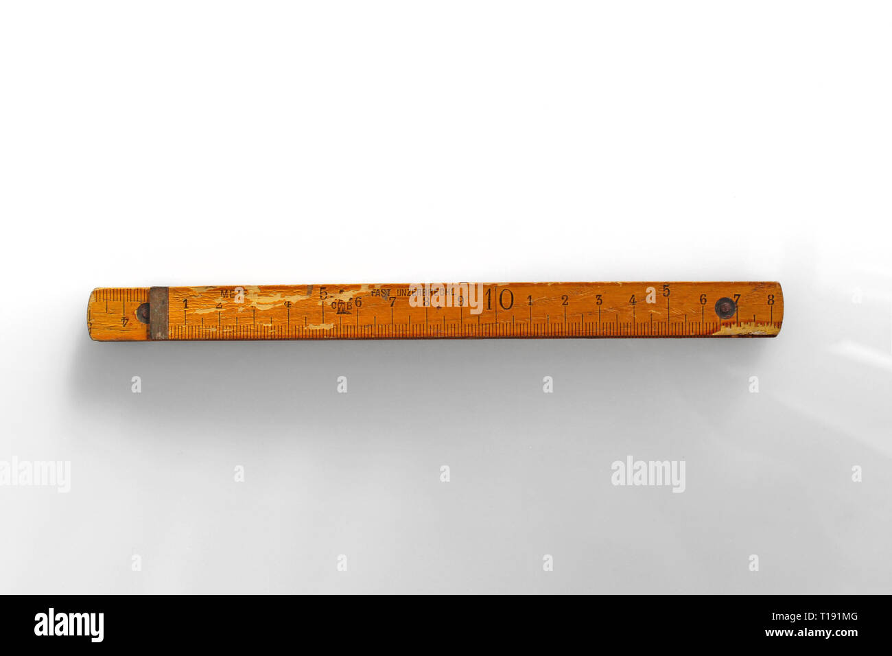 Vintage wooden folding ruler isolated on a white background.isolated on ...