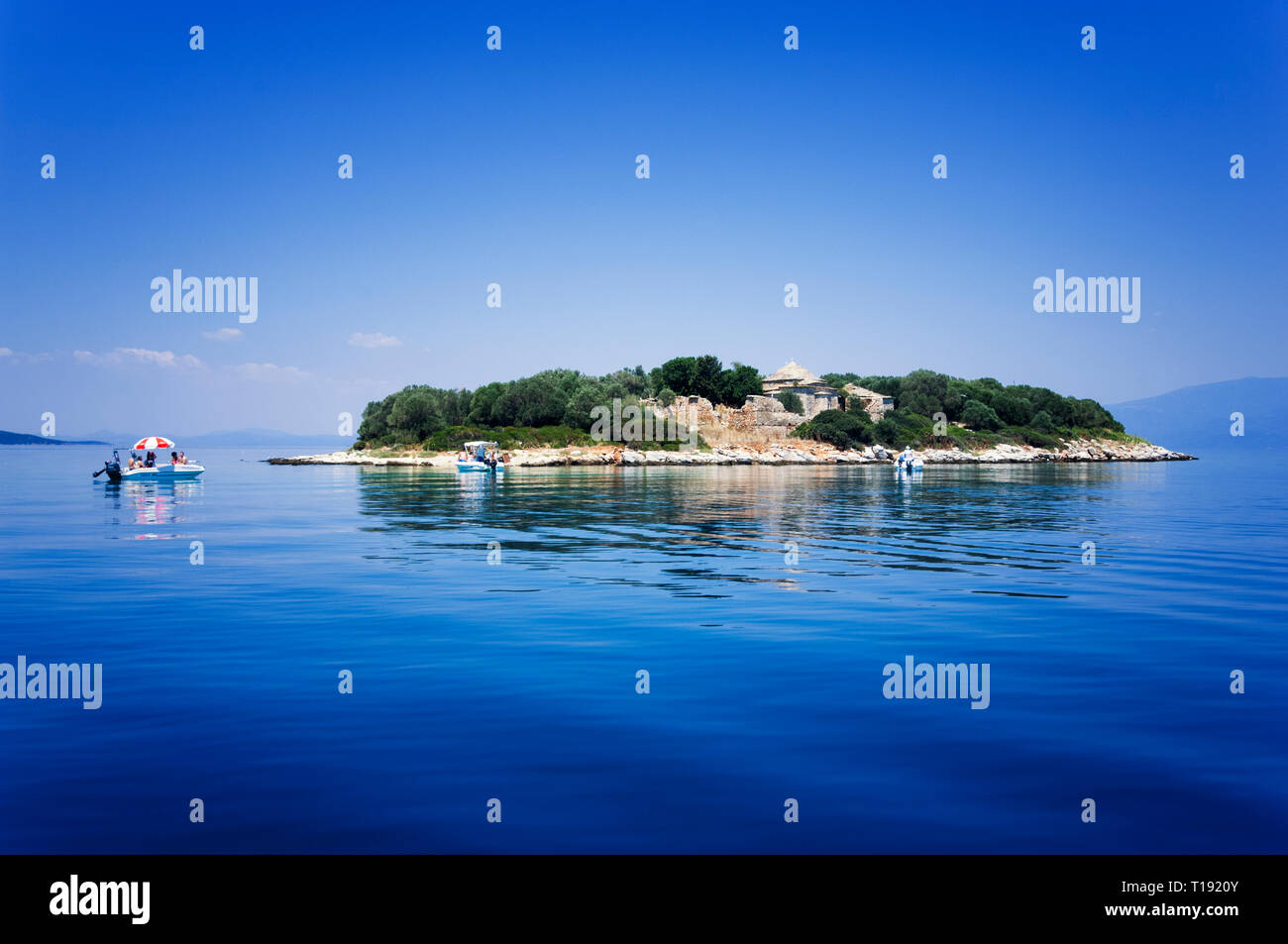 A small island with an abandoned monastery in the Pagasitic Gulf, Thessaly, Greece Stock Photo