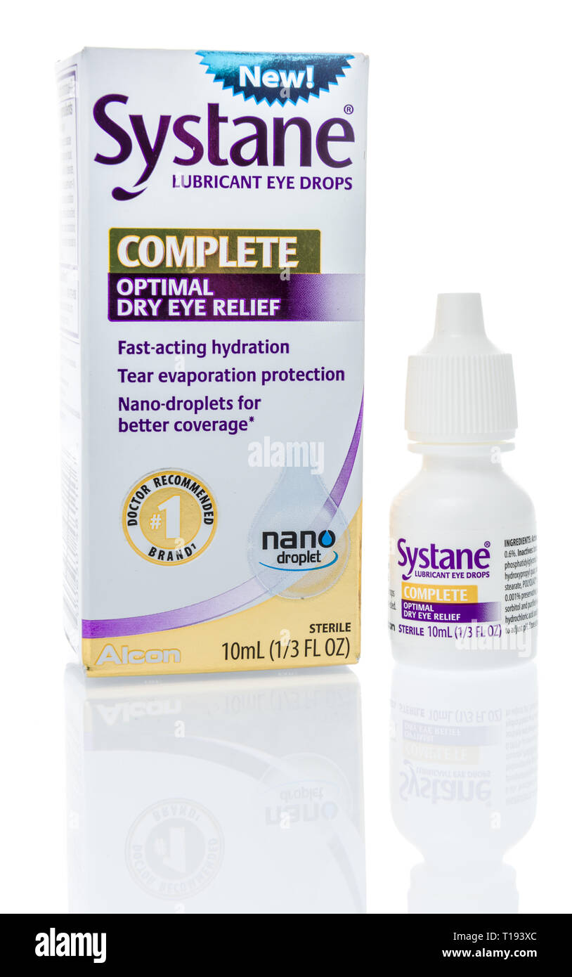 Winneconne, WI - 15 March 2019: A package of  Systane complete opltiam dry eye relief lubrican eye drops on an isolated background Stock Photo