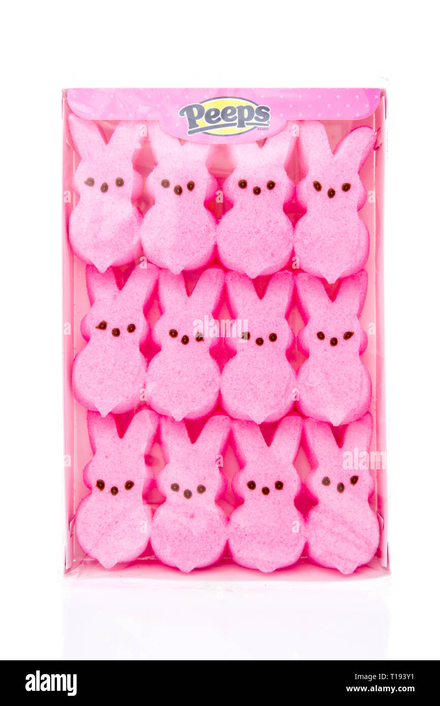 Winneconne, WI - 17 March 2019: A package of Peeps easter candy in pink and easter rabbit on an isolated background Stock Photo