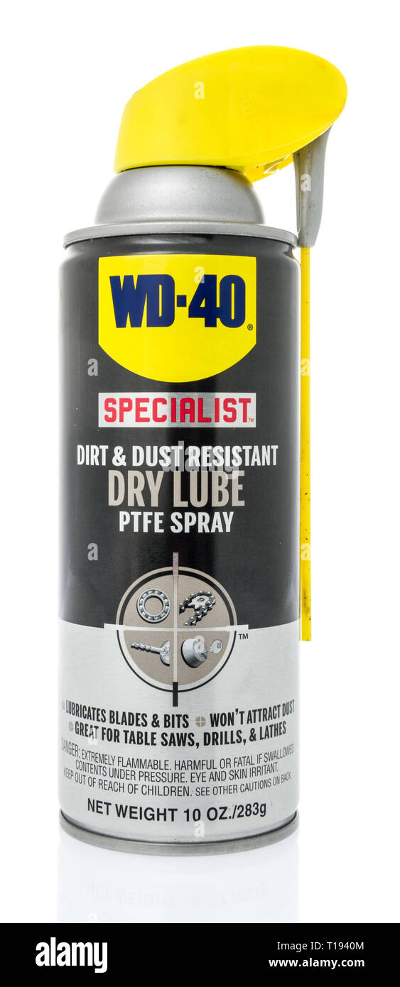 Winneconne, WI - 19 March 2019: A spray can of WD-40 specialist  dirt and dust resistant dry lube ptfe spray on an isolated background Stock Photo