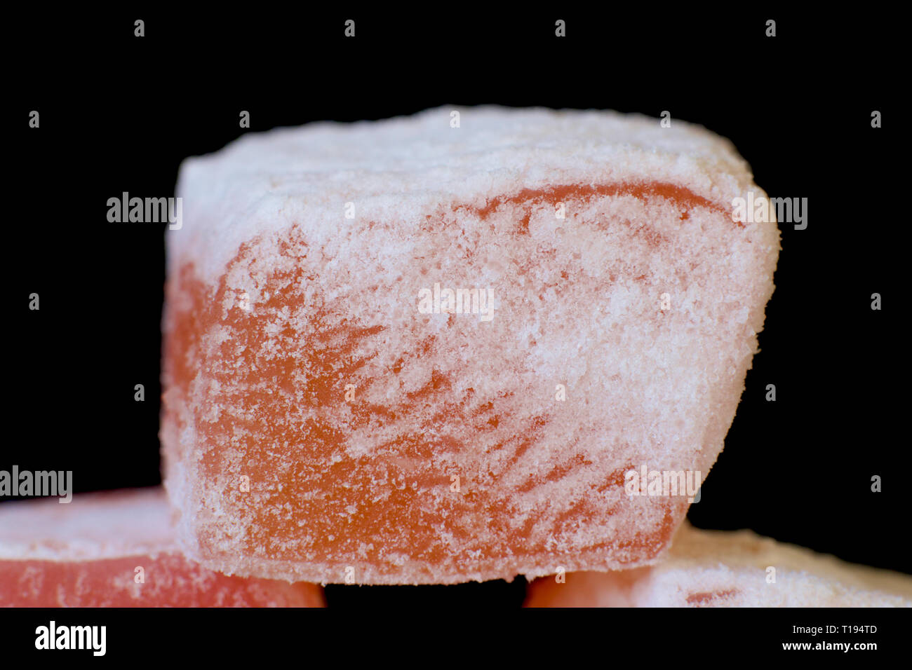 Rose coloured Turkish delight in a pattern. Stock Photo